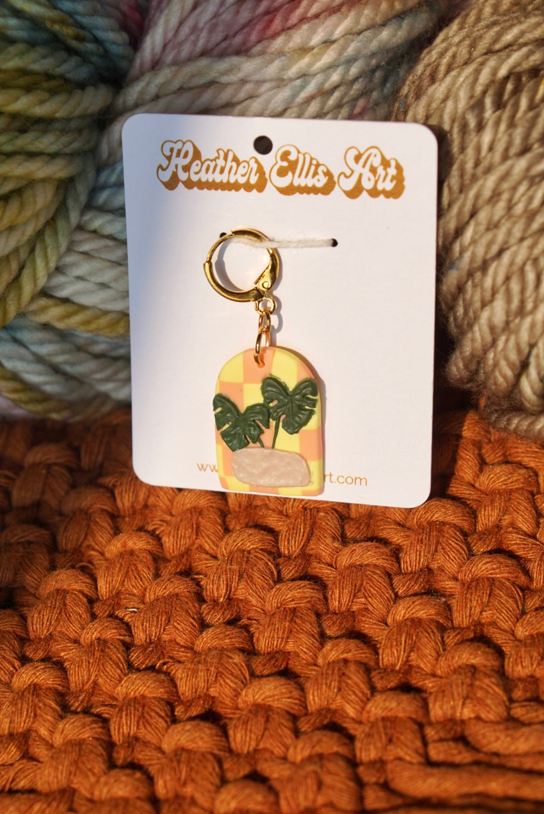 Checkerboard monstera stitch marker
