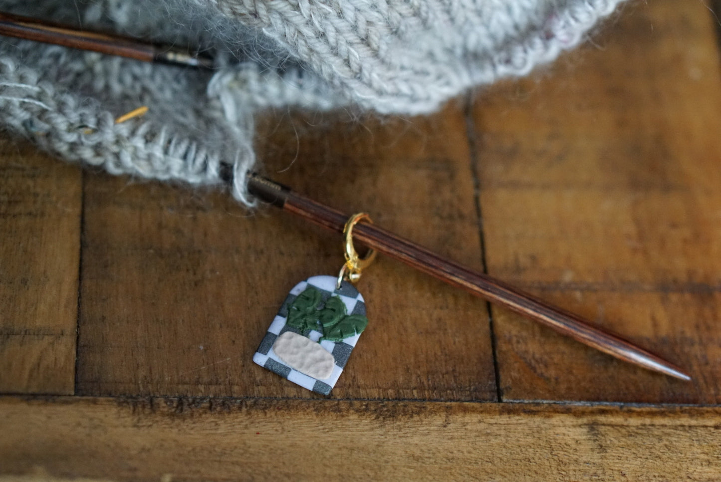 Checkerboard monstera stitch marker