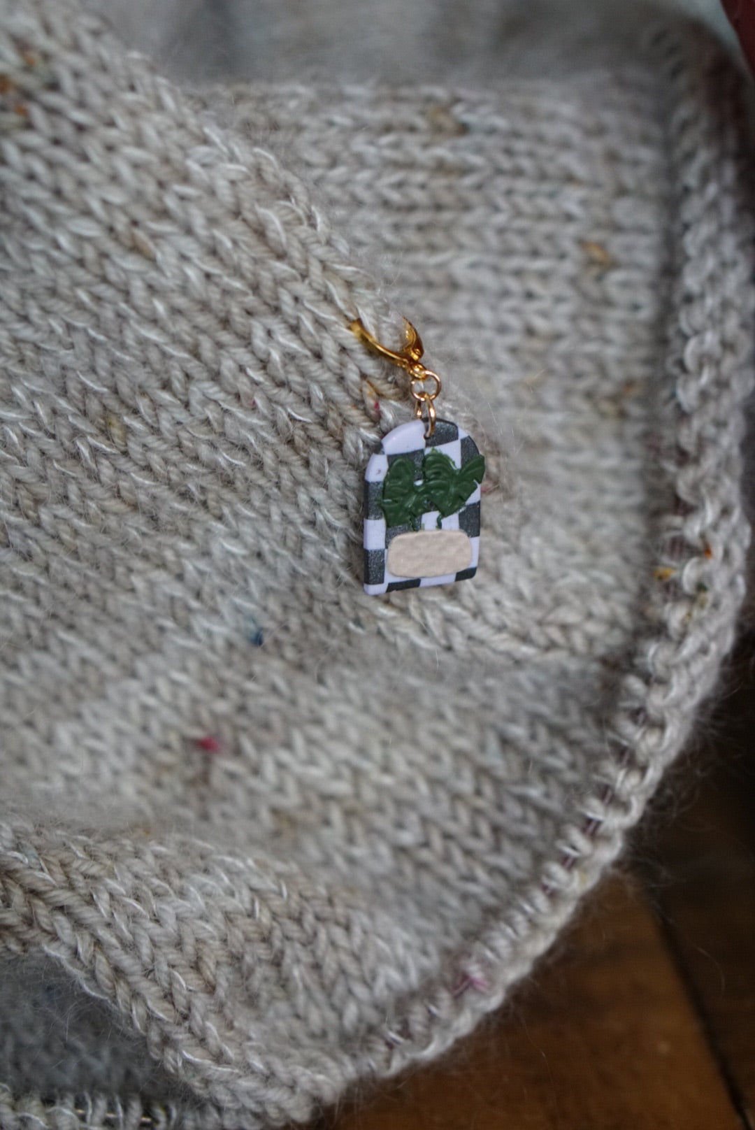 Checkerboard monstera stitch marker