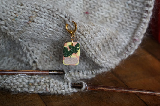 Checkerboard monstera stitch marker
