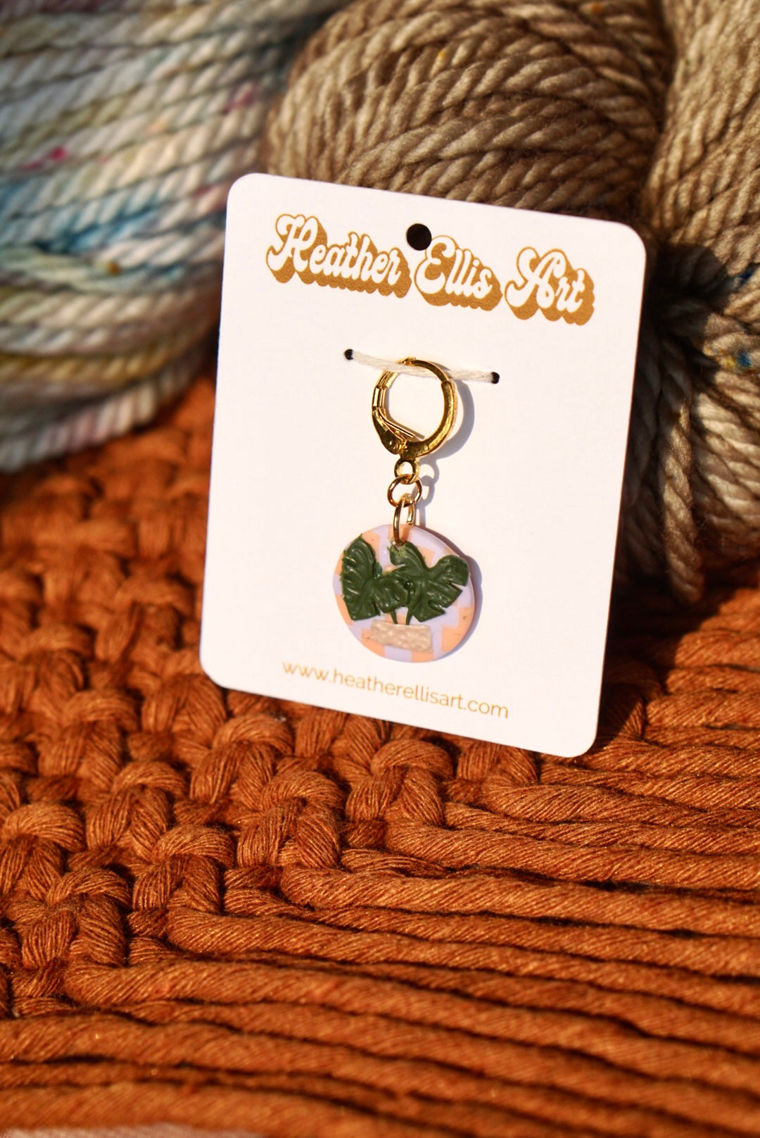 Checkerboard monstera stitch marker