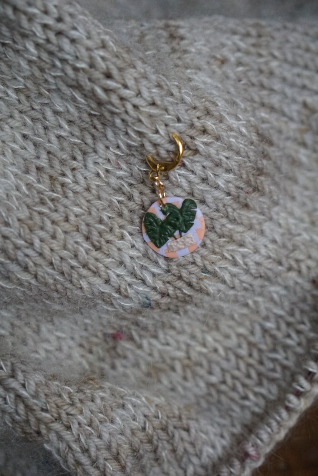 Checkerboard monstera stitch marker